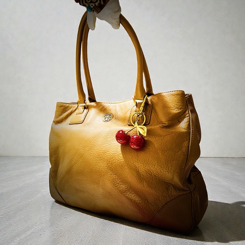 Tory Burch Tan Leather Tote with orange gold cherry keychain Charm - Picture 6 of 15